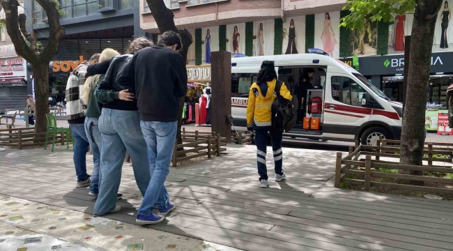 Mağazada yere düşen kadın yaralandı